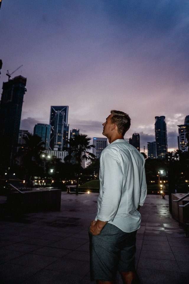 photo of man looking at downtown dallas auto transport services