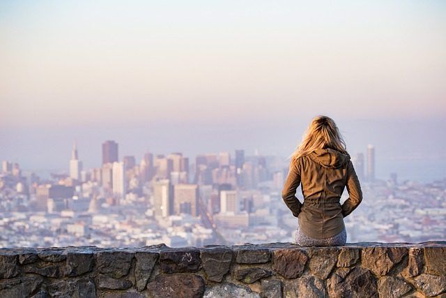 photo of young woman looking at San Francisco California car shipping