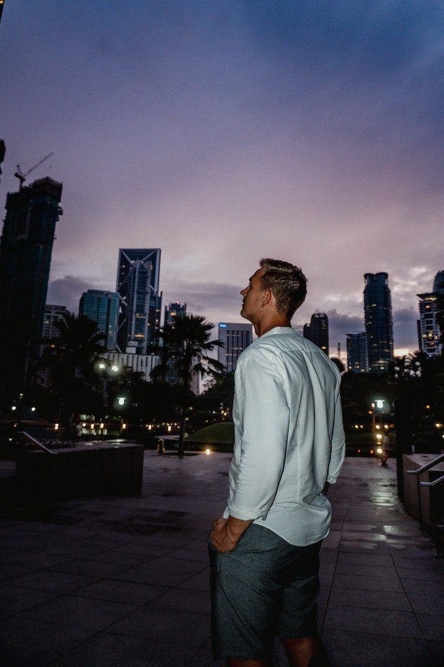photo of man looking at downtown dallas auto transport services
