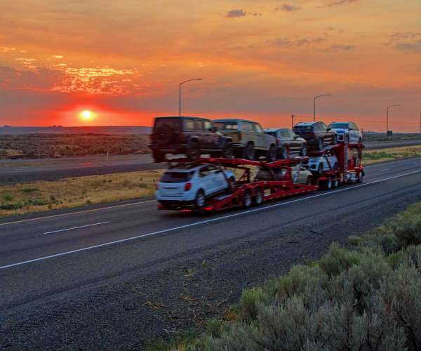 seasonal fluctuations in auto transport photo at sunset