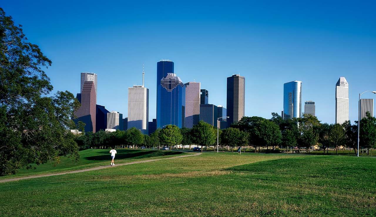 photo of downtown Houston view from park to ship a car