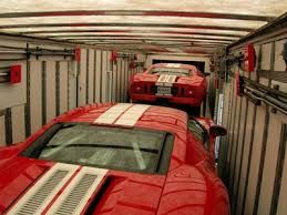 Loading a sports car into an Enclosed Car Transporter